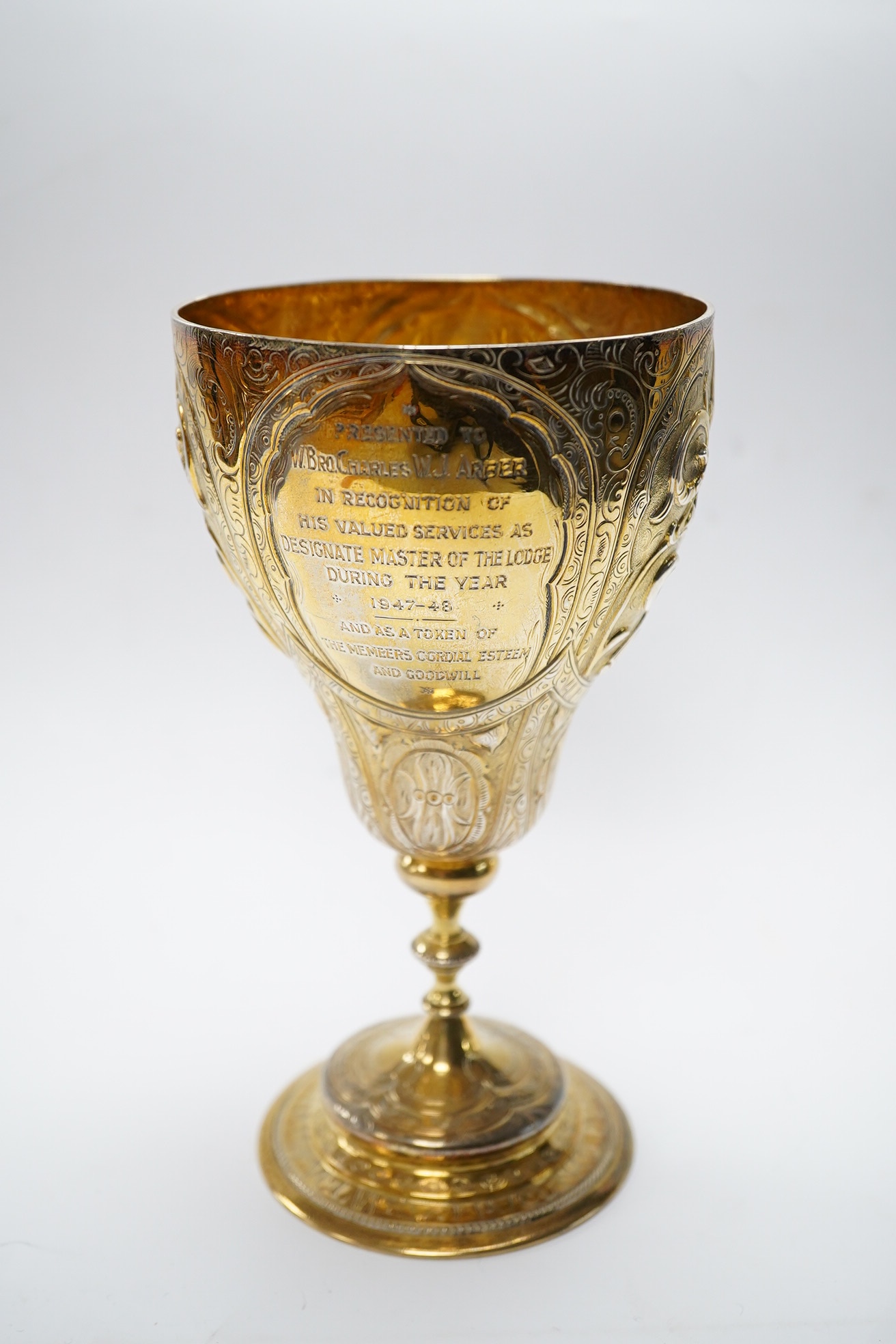 A Victorian embossed silver gilt goblet, Thomas Smily, London, 1866, 17.1cm, 6.7oz. Condition - poor to fair